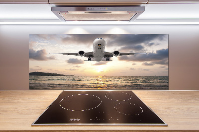 Keuken achterwand Een vliegtuig boven de zee