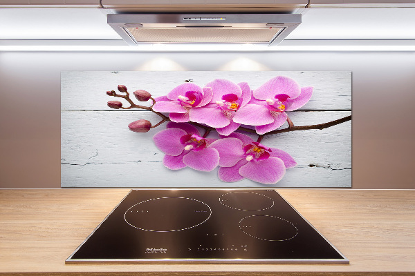 Glazen achterwand keuken Orchidee op hout