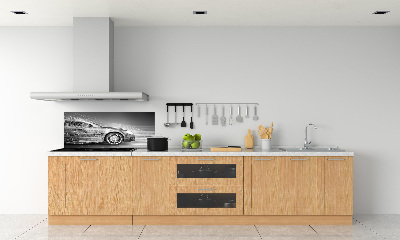 Spatscherm keuken Een auto die te hard rijdt