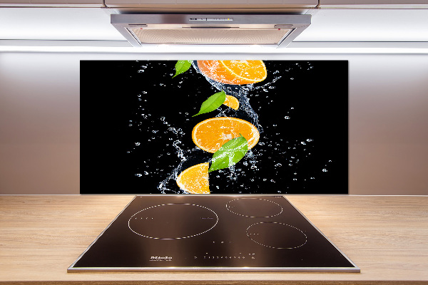 Glazen achterwand keuken Sinaasappels en water