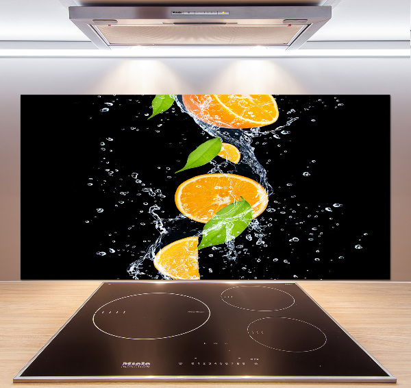 Glazen achterwand keuken Sinaasappels en water