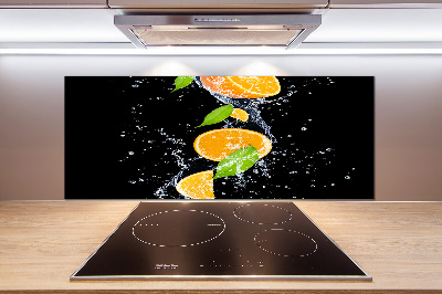 Glazen achterwand keuken Sinaasappels en water
