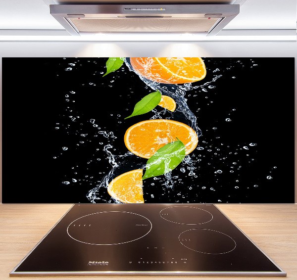 Glazen achterwand keuken Sinaasappels en water