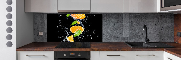 Glazen achterwand keuken Sinaasappels en water