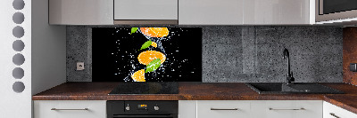 Glazen achterwand keuken Sinaasappels en water