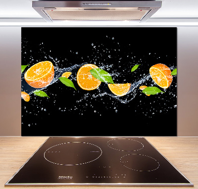 Glazen achterwand keuken Sinaasappels en water