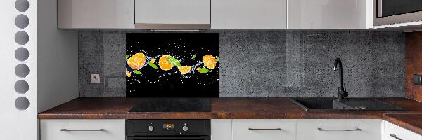Glazen achterwand keuken Sinaasappels en water