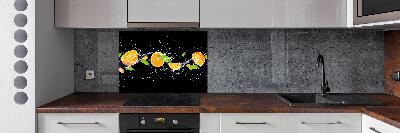 Glazen achterwand keuken Sinaasappels en water