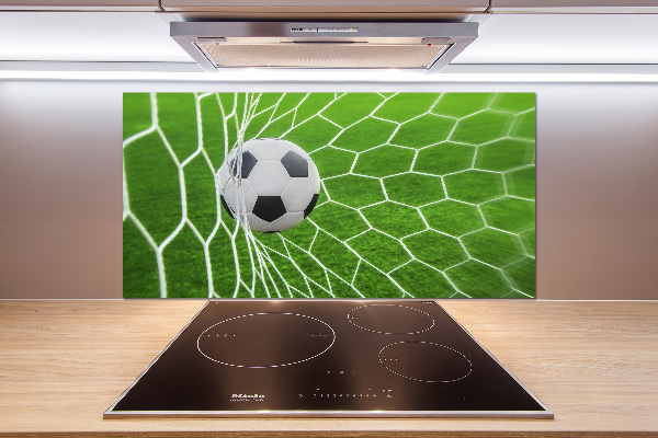 Keuken achterwand De bal ligt in het doel.