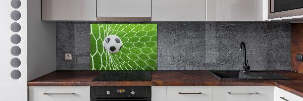 Keuken achterwand De bal ligt in het doel.