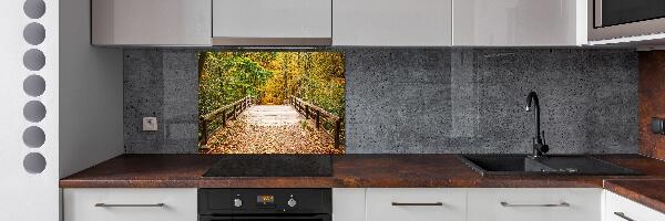 Glazen achterwand keuken Brug in het herfstbos