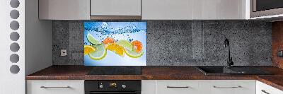 Spatplaat keuken Citrusvruchten onder water