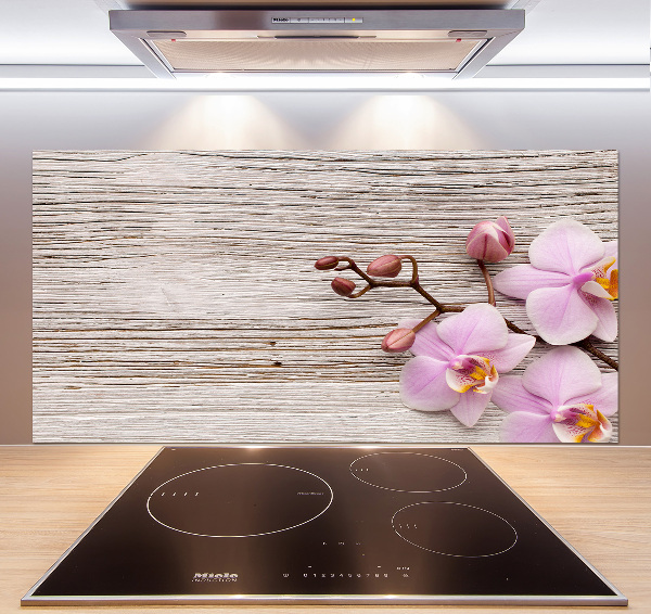 Glazen achterwand keuken Orchidee op hout