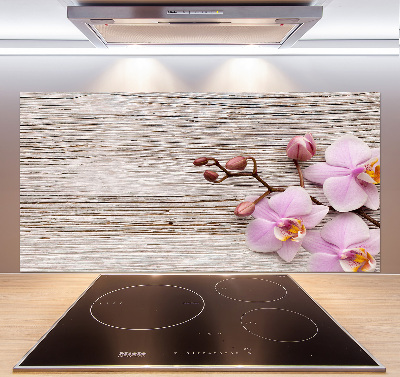 Glazen achterwand keuken Orchidee op hout