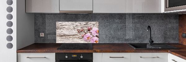 Glazen achterwand keuken Orchidee op hout