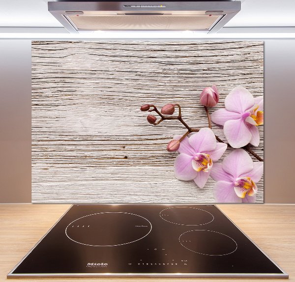 Glazen achterwand keuken Orchidee op hout