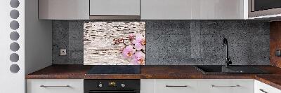 Glazen achterwand keuken Orchidee op hout