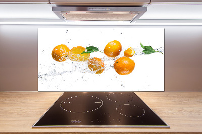 Glazen achterwand keuken Sinaasappels en water