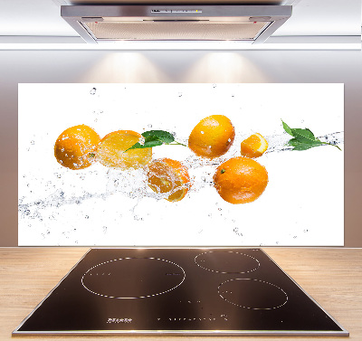 Glazen achterwand keuken Sinaasappels en water