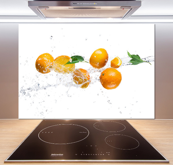 Glazen achterwand keuken Sinaasappels en water