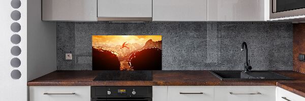 Spatscherm keuken Spring over de afgrond