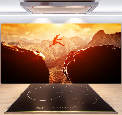 Spatscherm keuken Spring over de afgrond