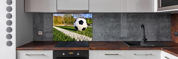 Spatscherm keuken De bal ligt in het doel.