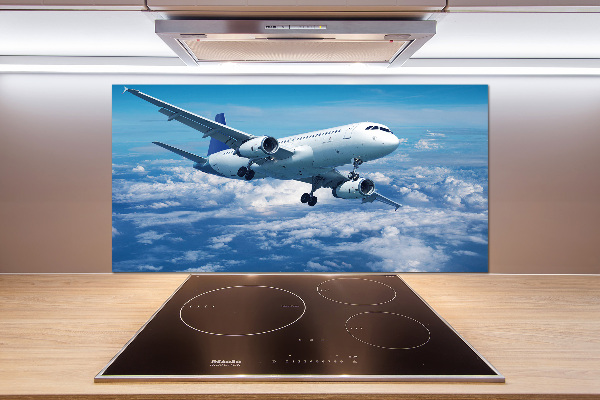 Keuken achterwand Een vliegtuig in de wolken