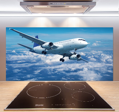 Keuken achterwand Een vliegtuig in de wolken