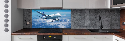 Keuken achterwand Een vliegtuig in de wolken
