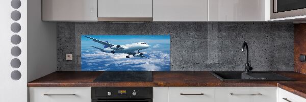 Keuken achterwand Een vliegtuig in de wolken