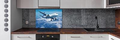 Keuken achterwand Een vliegtuig in de wolken