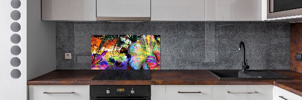 Spatplaat keuken Bloemen en een vlinder