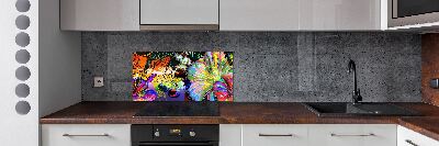 Spatplaat keuken Bloemen en een vlinder