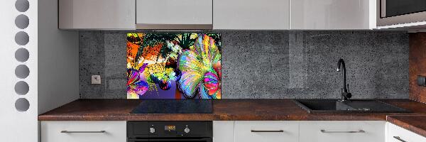 Spatplaat keuken Bloemen en een vlinder