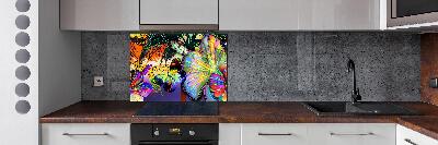 Spatplaat keuken Bloemen en een vlinder