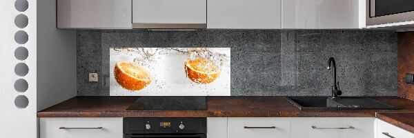 Spatscherm keuken Sinaasappels onder water