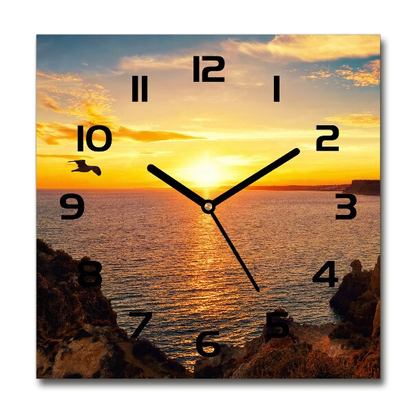 Vierkante glas klok Zonsondergang aan zee