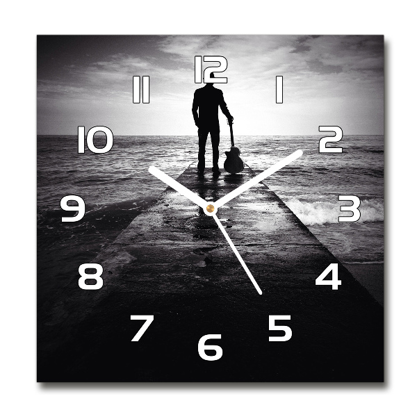 Vierkante glazen klok Gitarist op de pier