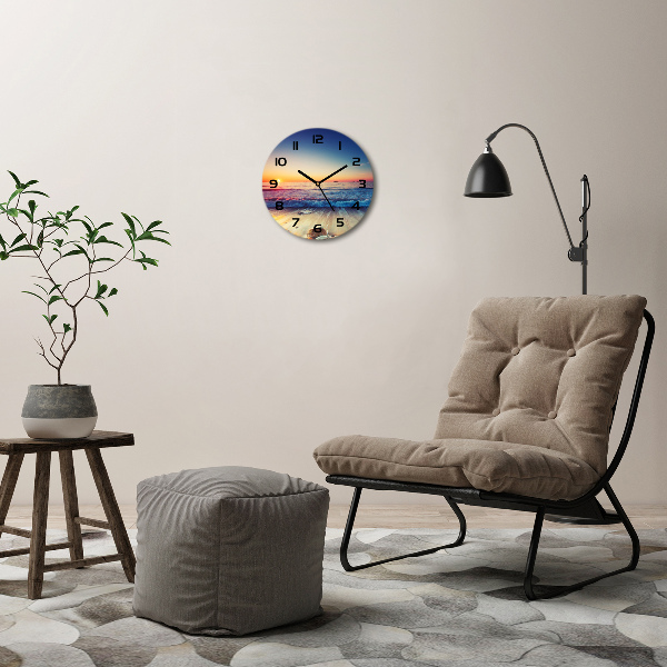 Ronde glas klok Zonsopgang aan zee