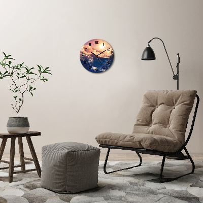 Ronde glazen wandklok De zon boven de bergen