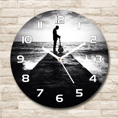 Ronde glas klok Gitarist op de pier