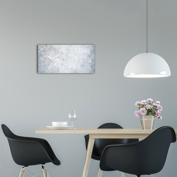 Langwerpige wandklok van glas Betonnen achtergrond
