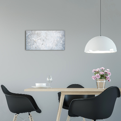 Langwerpige wandklok van glas Betonnen achtergrond