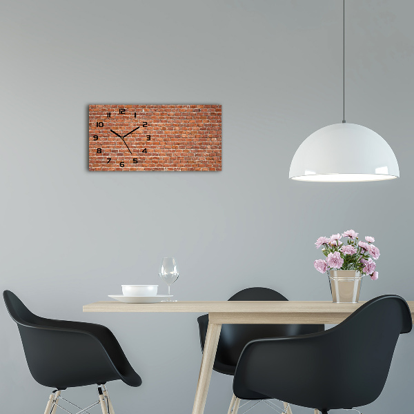 Langwerpige wandklok van glas Bakstenen muur