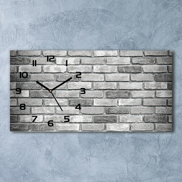 Langwerpige wandklok van glas Bakstenen muur