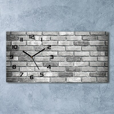 Langwerpige wandklok van glas Bakstenen muur