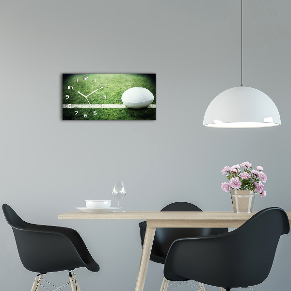 Langwerpige wandklok van glas Rugbybal