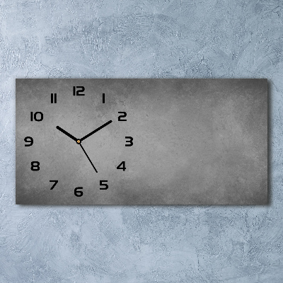Langwerpige wandklok van glas Betonnen achtergrond