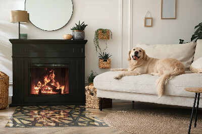 Vloerplaat openhaard Geometrische patronen met een houten achtergrond.